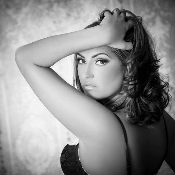 model posing sexy over the shoulder, in black and white